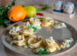 Tortelloni agli agrumi con ragù di merluzzo e topinambur